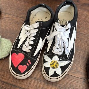 Vans Black and White Sneakers with Bold Graphic Design